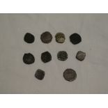 A selection of old Indian Moghul silver and bronze coins