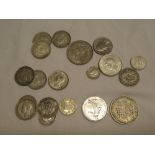 A selection of mixed silver and other coinage including 1934 half crown, 1936 and others,