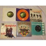 The Beatles original 45 rpm double record set "Magical Mystery Tour" illustrated with both records