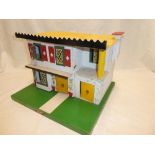 A 1960's Conway Valley painted wood dolls house