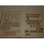 A stock book containing a good collection of India stamps,