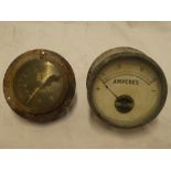 Two old gauges believed from an aircraft including temperature gauge and amp gauge