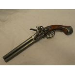 A replica flintlock over and under pistol (af)