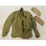 A Second War United States khaki combat jacket dated 1943 by Borman and two United States Marine