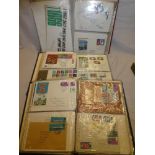 Three folder albums containing a collection of over 200 GB first day covers 1964-1972 including