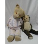 An old plush covered straw-filled teddy bear 26" long and old panda (2)