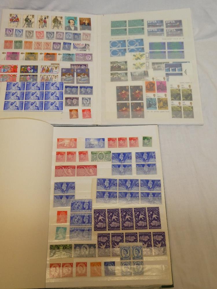 Two stockbooks containing a selection of GB stamps, mint in blocks,