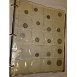 A folder album containing a collection of GB coins including some silver examples,