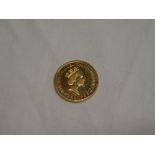 A 1987 gold quarter ounce Britannia coin (ef)