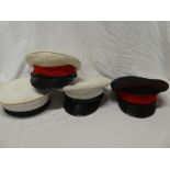Three various military peaked caps and a sailors hat (4)