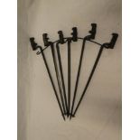 Six various 19th Century steel socket bayonets mounted on a wire work fan-shaped wall display