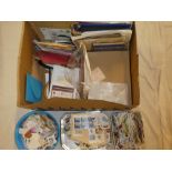 A large box of GB and World stamps on paper, albums,