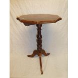 A 19th Century walnut octagonal snap-top occasional table on turned column with tripod base (af\