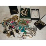 A selection of various costume jewellery including necklaces, brooches, Pandora pendant necklace,