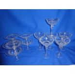 Two sets of six good quality cut glass pedestal bowls/goblets with tapered stems and circular bases