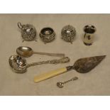 A small silver tapered vase, Art Deco silver preserve spoon, electroplated trowel,