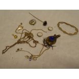 A selection of various costume jewellery including necklaces, decorative pendant, stick pin,