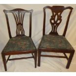 Six 19th Century similar mahogany Chippendale-style dining chairs with pierced vase splat backs and