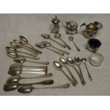 A selection of 18th and 19th Century silver teaspoons together with a small silver three piece