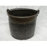 A 19th Century copper and brass circular peat-style bucket with iron swing handle