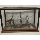 A wooden scale model of three-masted gunship "Hispanoli" in brass mounted mahogany case,