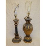 Two modern gilt and black decorated table lamps with raised decoration