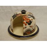 A Doulton pottery Leach patent "Alma" pattern circular revolving cheese dish with floral decoration,