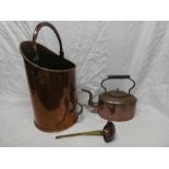 A Victorian copper oval kettle with scroll handle,