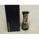 A 2005 Moorcroft pottery "Oriental Poppy" pattern tapered vase, four star piece No.