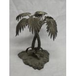 A silver plated table centre stand in the form of two palm trees,