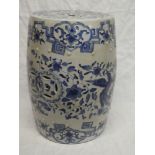 A 20th Century Eastern pottery barrel-shaped garden seat with blue and white decoration,
