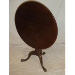 A 19th Century mahogany circular snap-top occasional table on turned column with tripod base