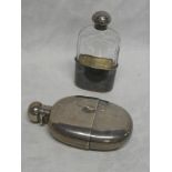 An Edward VII silver oval hip flask with hinged lid,