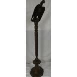 An large unusual polished mahogany lectern-type stand with carved eagle top,