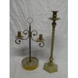 A good quality brass and iron adjustable twin branch candle lamp with scroll-shaped stem and
