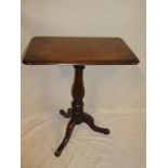 A 19th Century mahogany rectangular occasional table on turned column with tripod base