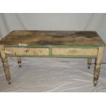 A 19th Century painted pine rectangular kitchen table,