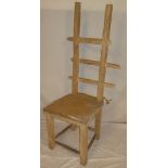 An unusual Continental rustic pine ladder back chair with rattan seat on square legs