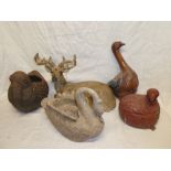 A selection of various figures including terracotta pelican jardiniere, composition swan bowl,