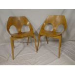 A set of four 1950/60s Kandya laminate stacking dining chairs with original labels