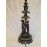 A bronzed spelter table lamp in the form of two Victorian sailors standing in boat,