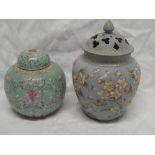 A good quality glazed pot pourri and cover with floral decoration on pale blue ground (inner lid