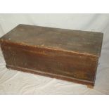 A 19th Century stained pine rectangular trunk with hinged lid,