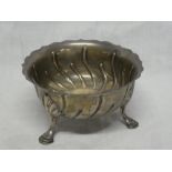A late Victorian silver circular sweetmeat bowl on three hoof feet, 5" diameter,