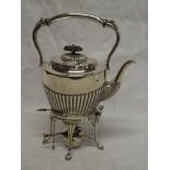 A good quality silver plated oval spirit kettle by Barker Brothers on oval stand with burner