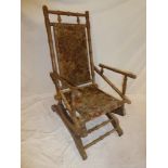 An American-style beechwood rocking chair with bamboo-effect frame