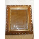 A Victorian bevelled rectangular wall mirror in polished oak and gilt rectangular frame,