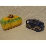 A blue glazed pottery racing car teapot "OK T42" and a Beswick Art Deco oval biscuit jar and cover