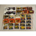 A selection of mint and boxed diecast commercial vehicles and delivery vans including Days Gone,