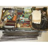 Three boxes containing a selection of OO gauge railway items including part locomotives, carriages,